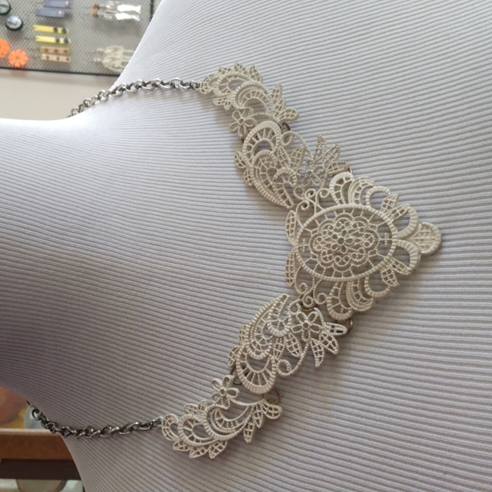 Lace look bib necklace